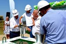 Laying the foundation stone for the construction of Olgino dairy